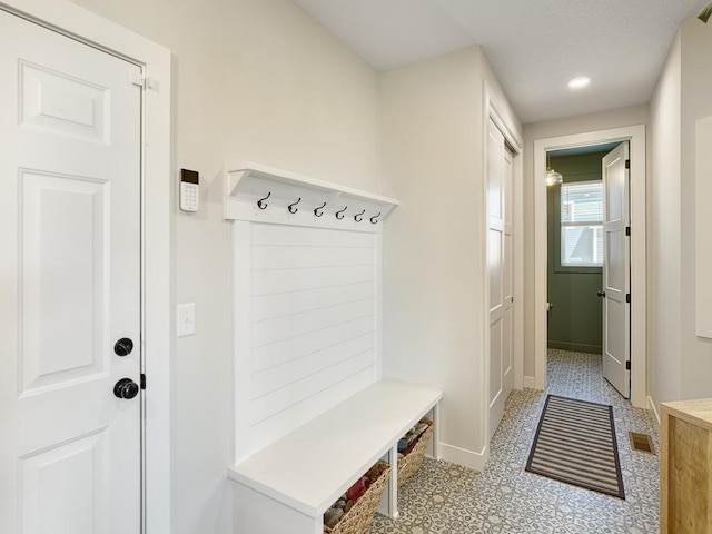 15441 110th Ave N, Dayton, MN 55369 - mudroom featuring baseboards and light flooring