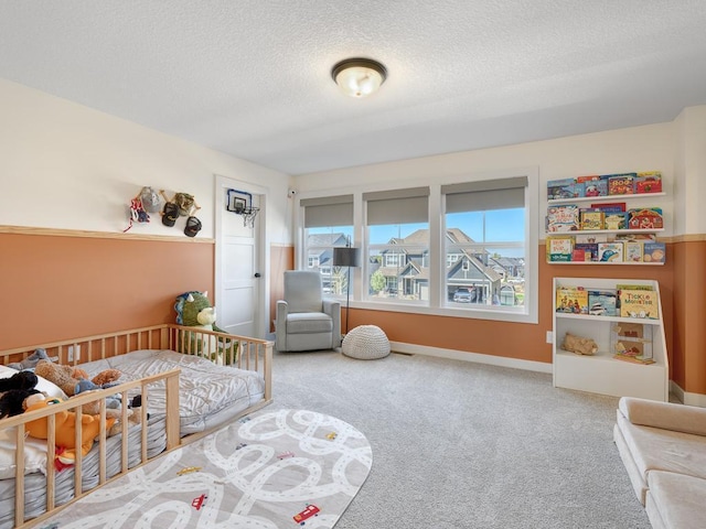 15441 110th Ave N, Dayton, MN 55369 - bedroom with carpet, a textured ceiling, and baseboards
