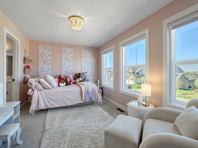 15441 110th Ave N, Dayton, MN 55369 - carpeted bedroom with multiple windows and baseboards