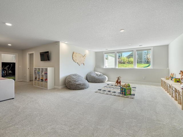 15441 110th Ave N, Dayton, MN 55369 - recreation room featuring carpet, recessed lighting, a textured ceiling, and baseboards