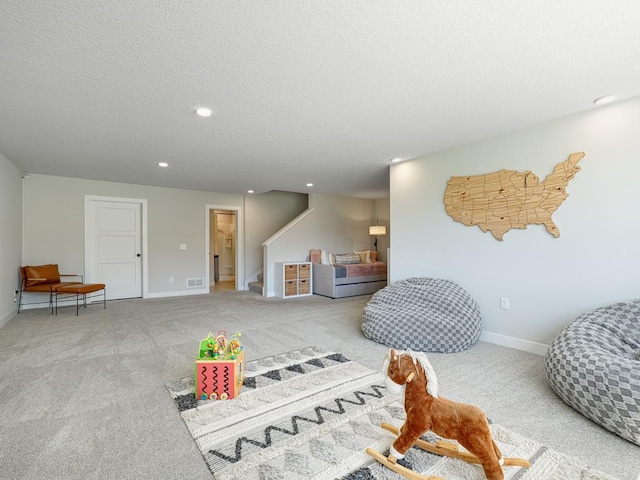 15441 110th Ave N, Dayton, MN 55369 - rec room with carpet floors, recessed lighting, baseboards, and a textured ceiling