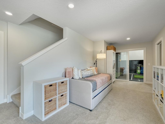 15441 110th Ave N, Dayton, MN 55369 - carpeted bedroom with recessed lighting, a textured ceiling, and baseboards