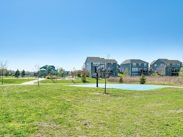 15441 110th Ave N, Dayton, MN 55369 - surrounding community featuring community basketball court, a residential view, and a lawn