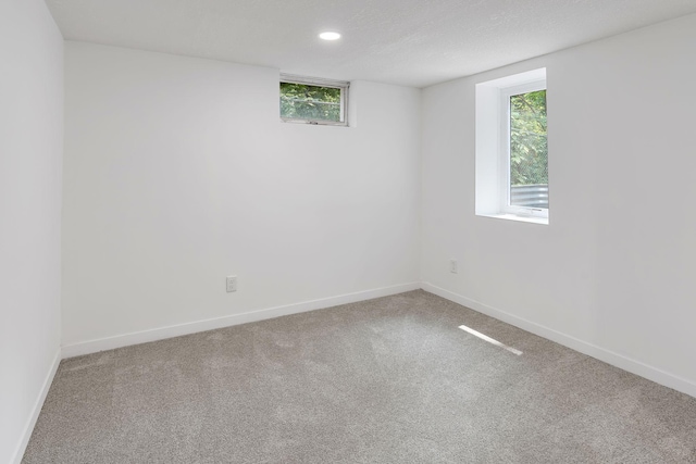 549 Annapolis St E, Saint Paul, MN 55118 - carpeted empty room featuring baseboards and recessed lighting