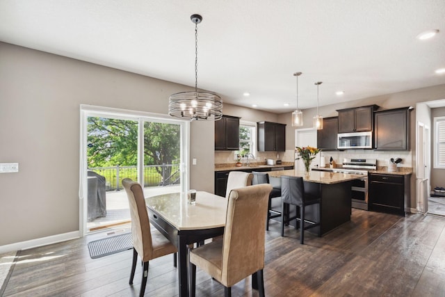 4847 Ashton Curv, Woodbury, MN 55129 - dining space with dark wood-style floors, a chandelier, recessed lighting, and baseboards