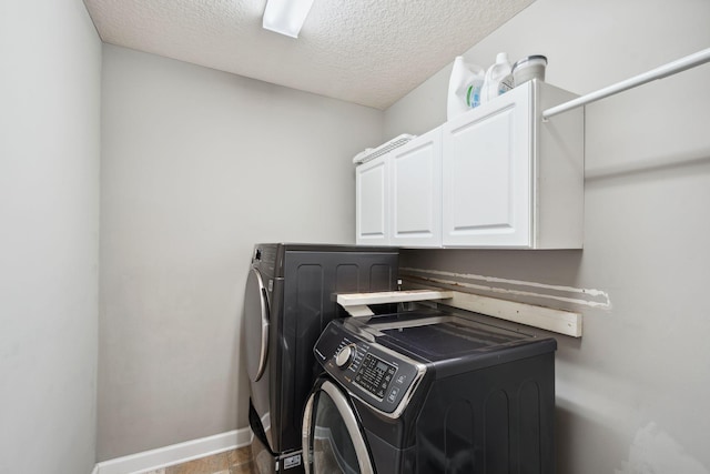 4847 Ashton Curv, Woodbury, MN 55129 - laundry room with independent washer and dryer, cabinet space, baseboards, and a textured ceiling
