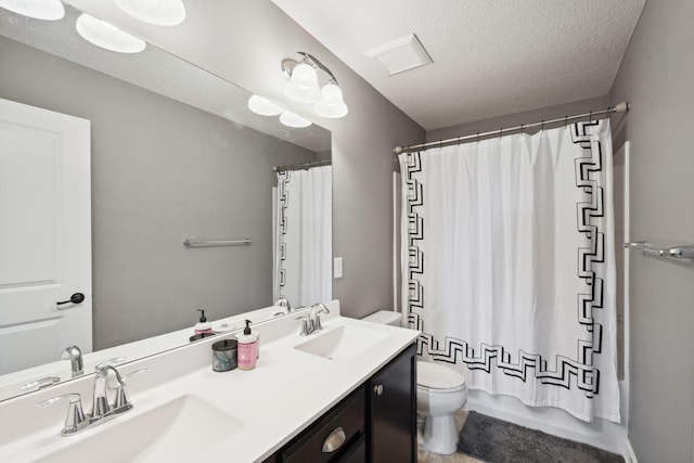 4847 Ashton Curv, Woodbury, MN 55129 - bathroom featuring toilet, double vanity, a textured ceiling, and shower / bathtub combination with curtain