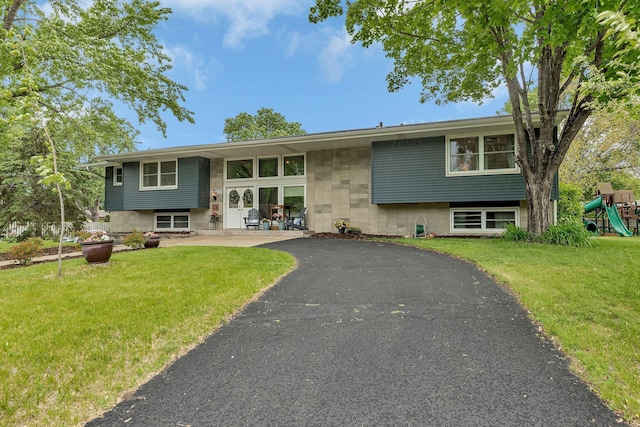 1276 13th Ave N, Saint Cloud, MN 56303 - split foyer home with a playground and a front yard