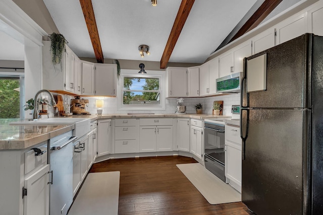 1276 13th Ave N, Saint Cloud, MN 56303 - kitchen featuring appliances with stainless steel finishes, decorative backsplash, dark wood finished floors, and white cabinetry