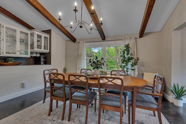 1276 13th Ave N, Saint Cloud, MN 56303 - dining room featuring baseboards, a chandelier, and wood finished floors