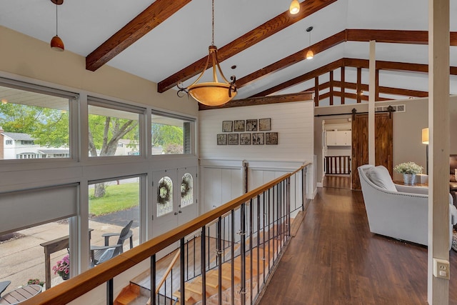 1276 13th Ave N, Saint Cloud, MN 56303 - corridor featuring a barn door and wood finished floors
