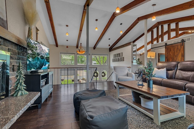 1276 13th Ave N, Saint Cloud, MN 56303 - living room with wood finished floors, a barn door, beam ceiling, and high vaulted ceiling