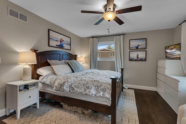 1276 13th Ave N, Saint Cloud, MN 56303 - bedroom featuring baseboards, wood finished floors, and ceiling fan