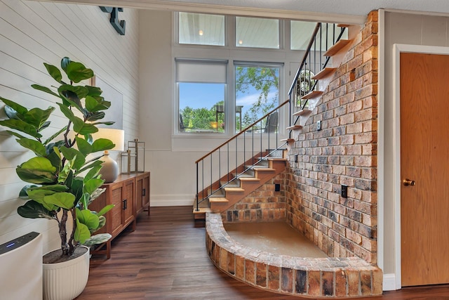 1276 13th Ave N, Saint Cloud, MN 56303 - stairway featuring wood finished floors and baseboards