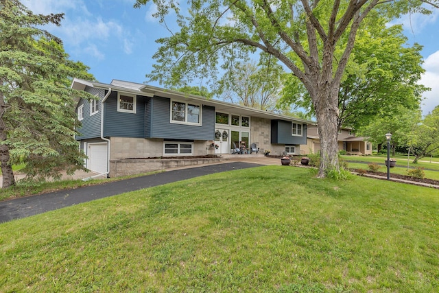 1276 13th Ave N, Saint Cloud, MN 56303 - raised ranch featuring a front yard and an attached garage