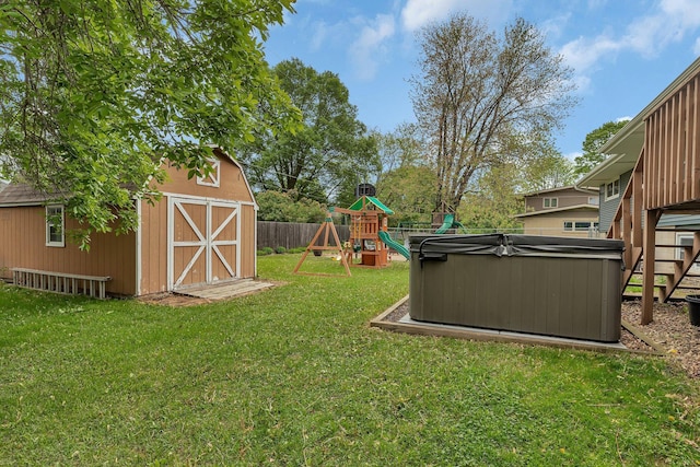 1276 13th Ave N, Saint Cloud, MN 56303 - view of yard with a hot tub and a playground