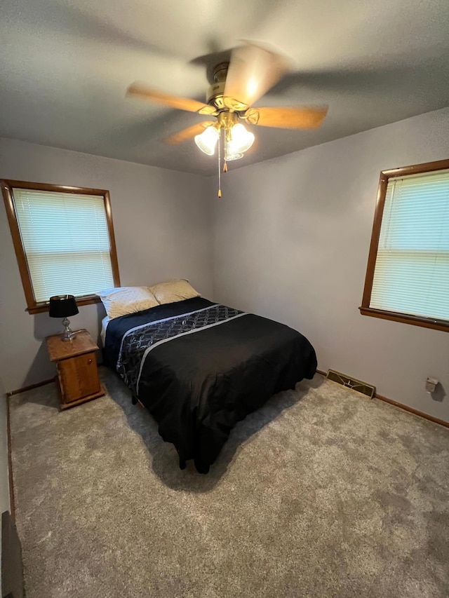 813 11th St N, Benson, MN 56215 - bedroom featuring carpet flooring and a ceiling fan