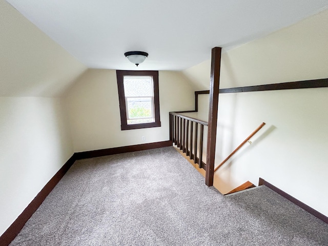 216 Main Ave S, New York Mills, MN 56567 - bonus room featuring carpet floors, lofted ceiling, and baseboards