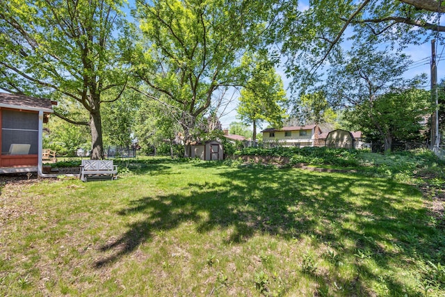 2445 Indian Way N, Saint Paul, MN 55109 - view of yard featuring a trampoline