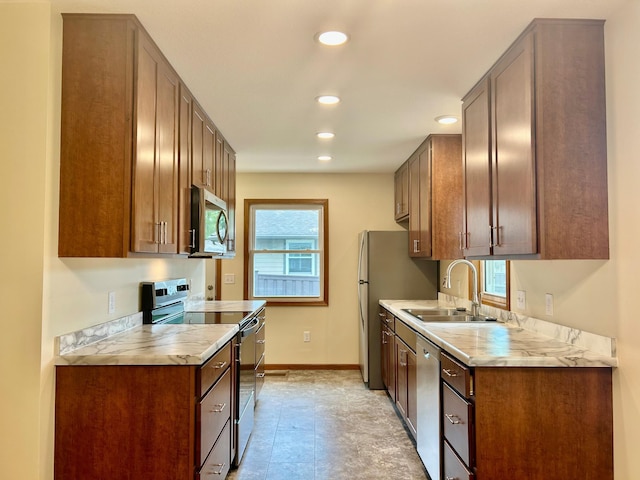 8212 15th Ave S, Bloomington, MN 55425 - kitchen with stainless steel appliances, a sink, plenty of natural light, recessed lighting, and light countertops