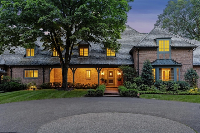 1150 Wyndmere Rd, Orono, MN 55391 - view of front of home featuring brick siding and a front yard