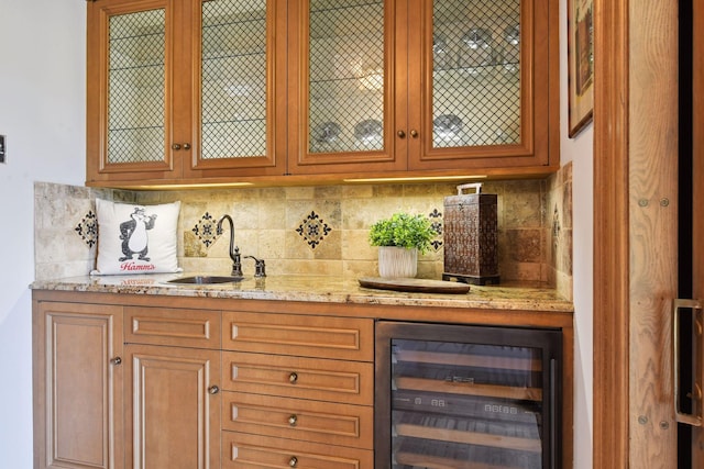 1150 Wyndmere Rd, Orono, MN 55391 - indoor wet bar with wine cooler and tasteful backsplash