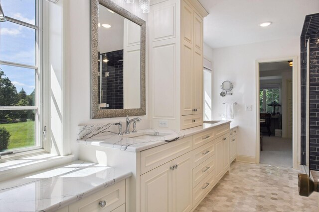 1150 Wyndmere Rd, Orono, MN 55391 - full bathroom with double vanity and recessed lighting