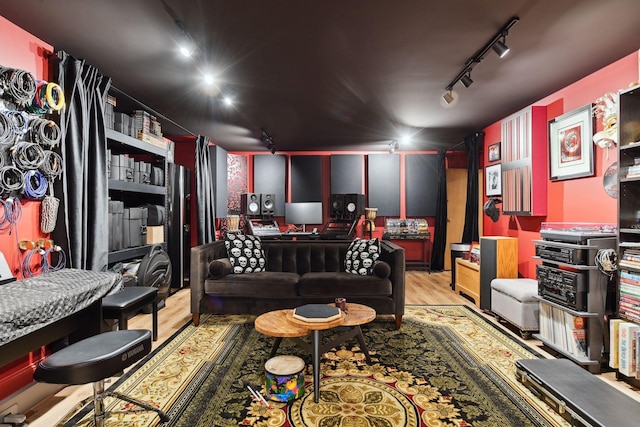 1150 Wyndmere Rd, Orono, MN 55391 - home theater featuring wood finished floors and rail lighting