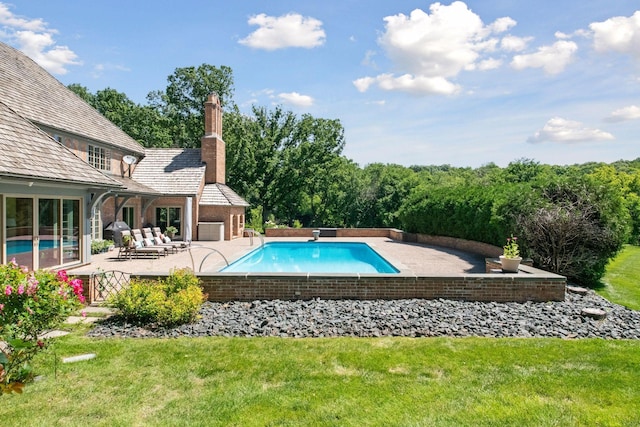 1150 Wyndmere Rd, Orono, MN 55391 - outdoor pool featuring a patio and a yard