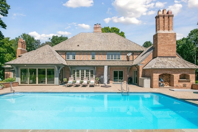 1150 Wyndmere Rd, Orono, MN 55391 - outdoor pool with a patio area