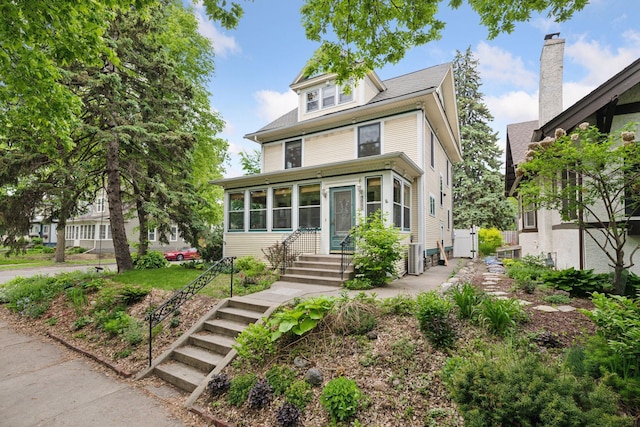 3252 Aldrich Ave S, Minneapolis, MN 55408 - traditional style home with a sunroom and a gate