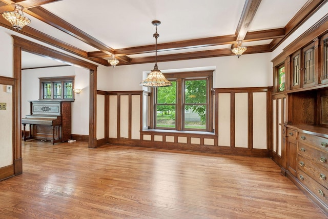 3252 Aldrich Ave S, Minneapolis, MN 55408 - unfurnished dining area featuring coffered ceiling, light wood-type flooring, beamed ceiling, and crown molding