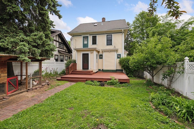 3252 Aldrich Ave S, Minneapolis, MN 55408 - rear view of property with a wooden deck and a chimney