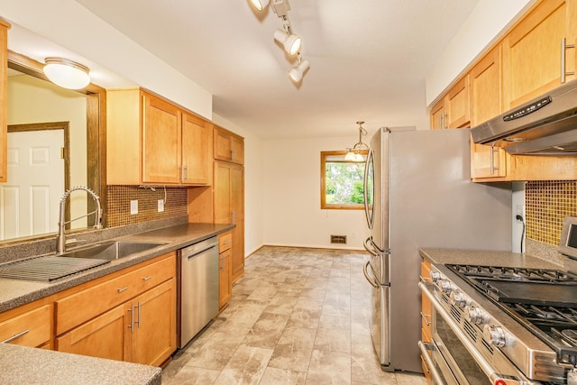 947 Dawn Ave, Shoreview, MN 55126 - kitchen featuring appliances with stainless steel finishes, a sink, wall chimney range hood, decorative backsplash, and baseboards