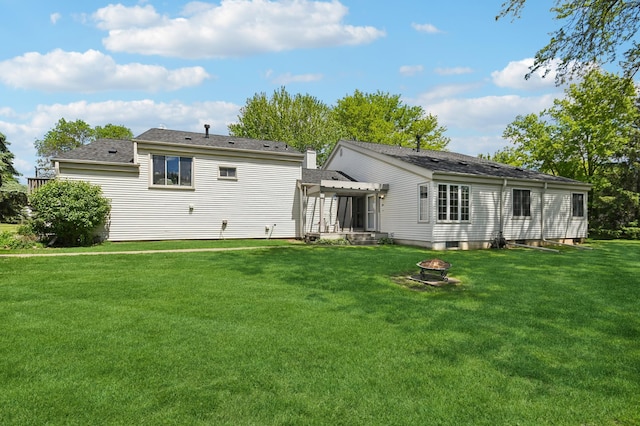 383 Elan Ct, Woodbury, MN 55125 - back of house with a pergola, a lawn, a shingled roof, and an outdoor fire pit