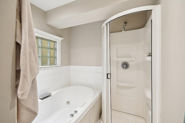 383 Elan Ct, Woodbury, MN 55125 - bathroom featuring a shower stall and a whirlpool tub