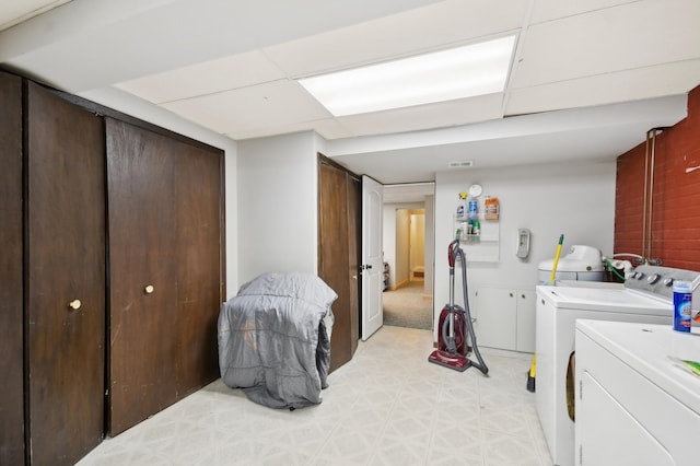 383 Elan Ct, Woodbury, MN 55125 - laundry area with independent washer and dryer and cabinet space
