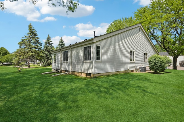 383 Elan Ct, Woodbury, MN 55125 - view of property exterior featuring cooling unit and a lawn