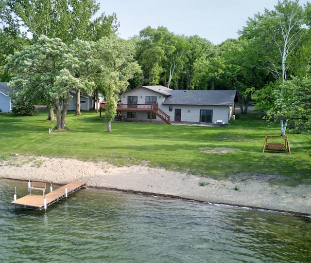 34347 Northview Rd, Everts Twp, MN 56515 - rear view of property with a yard, stairway, and a deck with water view