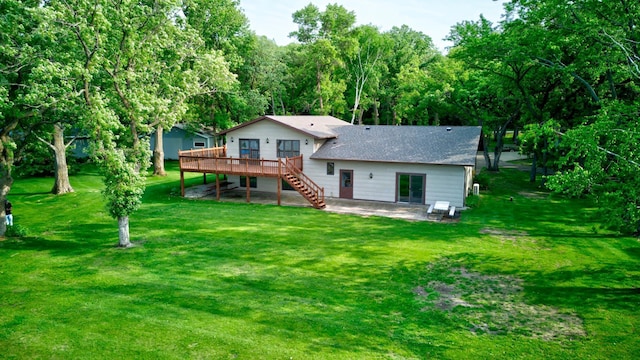 34347 Northview Rd, Everts Twp, MN 56515 - back of house with a wooden deck, stairs, a patio area, and a yard