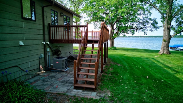 34347 Northview Rd, Everts Twp, MN 56515 - wooden deck featuring stairway, central AC, a water view, a yard, and a patio
