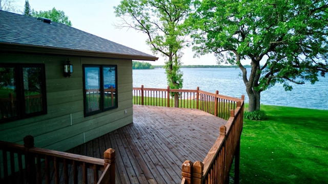34347 Northview Rd, Everts Twp, MN 56515 - wooden terrace featuring a water view and a yard