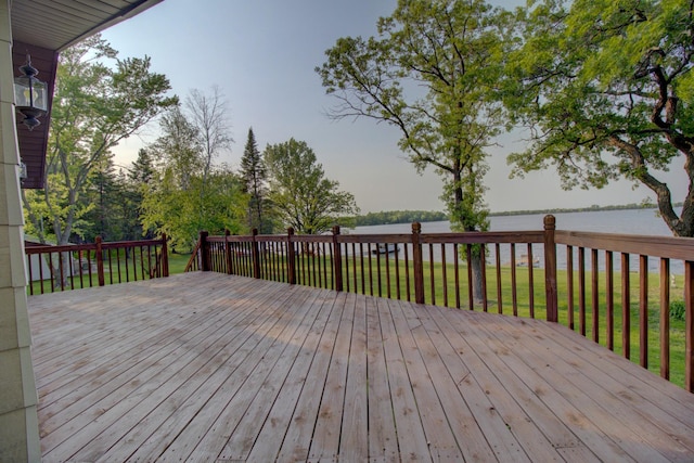 34347 Northview Rd, Everts Twp, MN 56515 - wooden deck featuring a yard and a water view