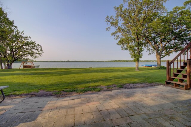 34347 Northview Rd, Everts Twp, MN 56515 - view of patio featuring stairs and a water view