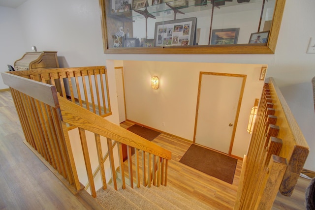 34347 Northview Rd, Everts Twp, MN 56515 - stairway featuring wood finished floors