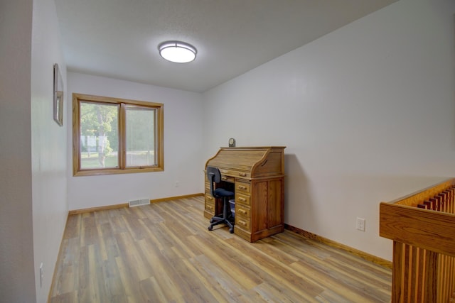 34347 Northview Rd, Everts Twp, MN 56515 - office area featuring light wood-type flooring and baseboards