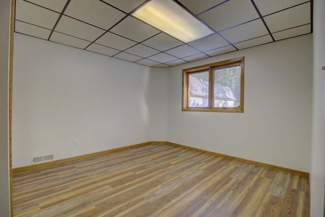 34347 Northview Rd, Everts Twp, MN 56515 - spare room featuring light wood-style floors, a paneled ceiling, and baseboards