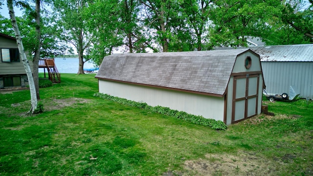 34347 Northview Rd, Everts Twp, MN 56515 - view of shed featuring stairway and a water view
