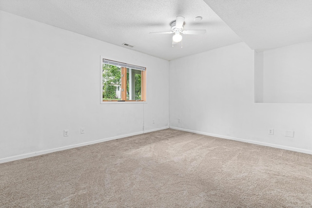 441 Lyman Blvd, Chanhassen, MN 55317 - carpeted spare room with a ceiling fan, baseboards, and a textured ceiling
