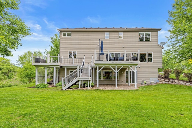 441 Lyman Blvd, Chanhassen, MN 55317 - back of property with a deck, stairs, and a lawn